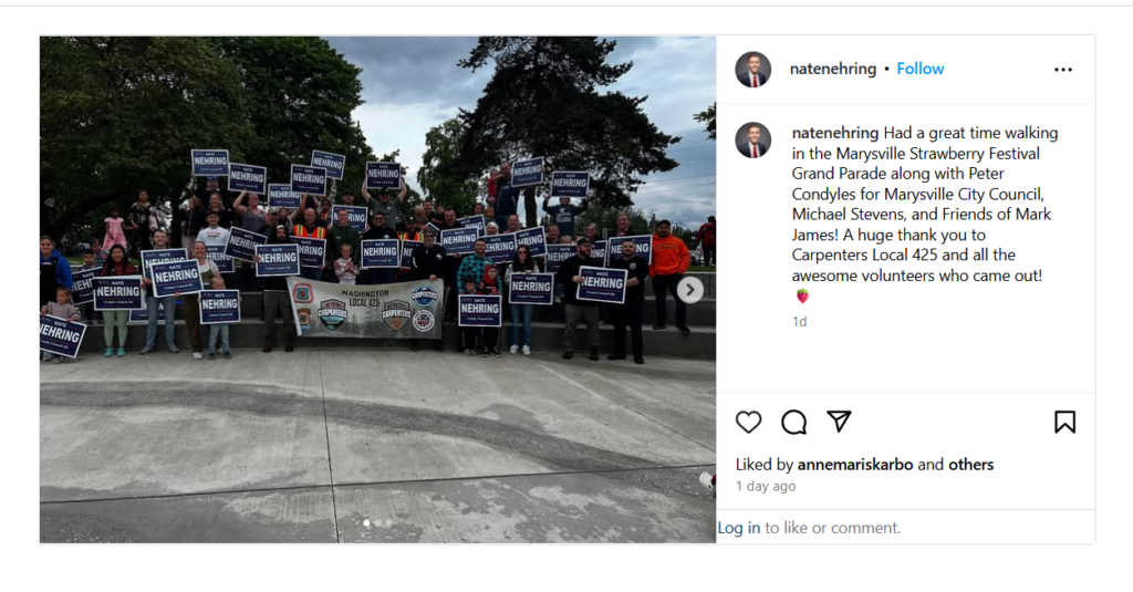 Local 425 Carpenters walking in the Marysville Strawberry Festival parade with Snohomish County Councilman Nate Nehring.
